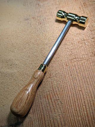 brass setting hammer from bad axe tool works with red oak handle