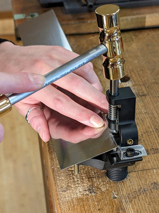 bad axe tool works brass setting hammer in use with hammer saw set