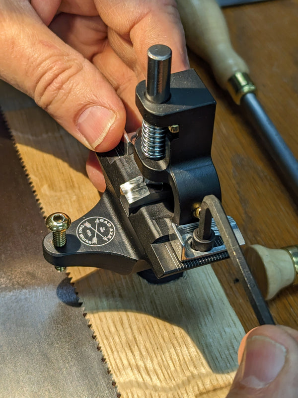 bad axe tool works hammer saw set in use making adjustments to fences