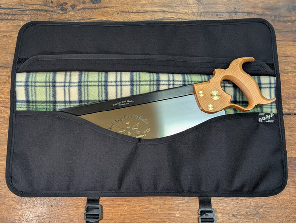 A tenon saw inside of our black saw tool bag