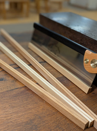 saw tooth guards that are made out of hardwood to protect saw teeth